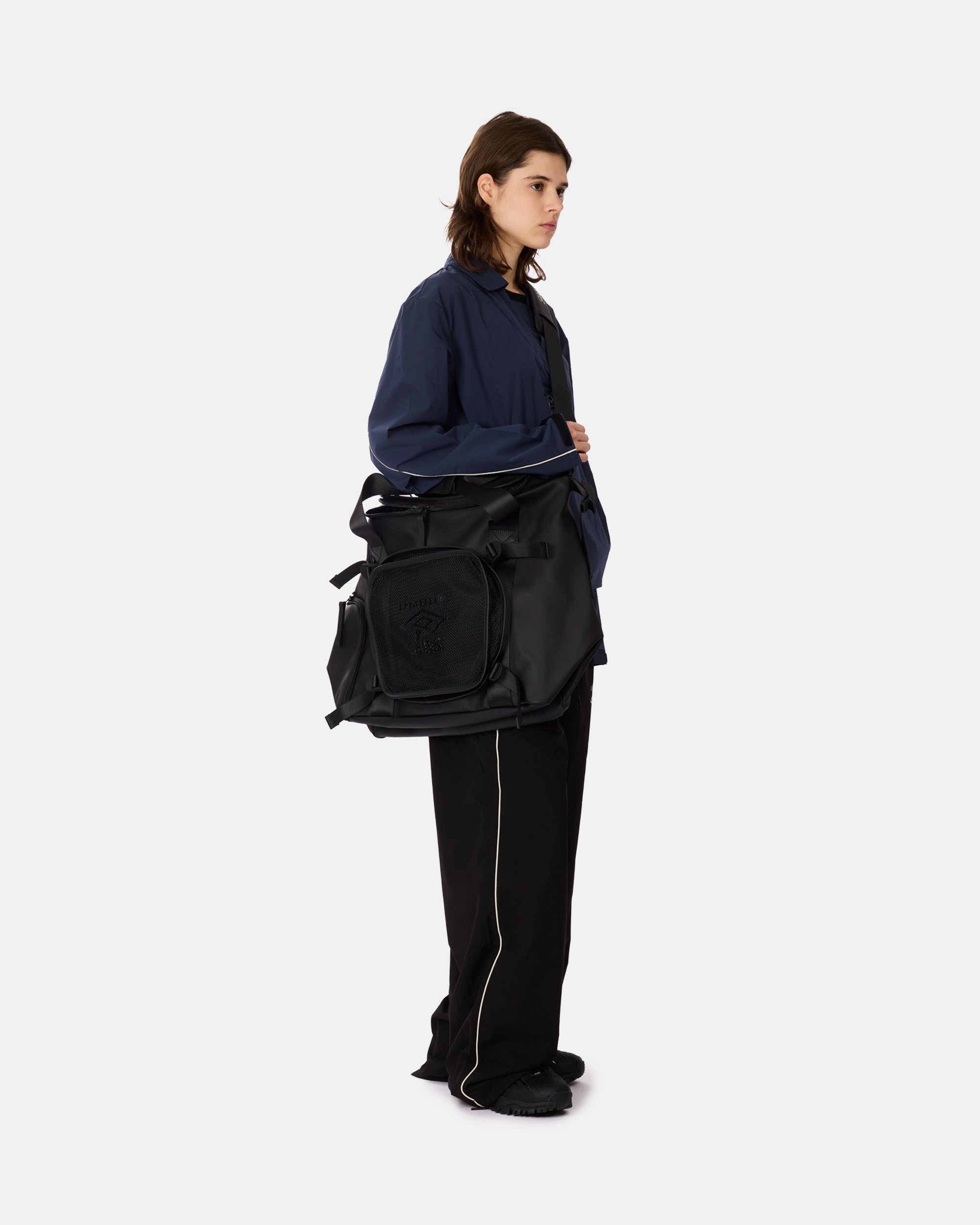 https us.urbanexcess.com products rains-duffel-bag-black Rains x Umbro Transfer Duffle Bag